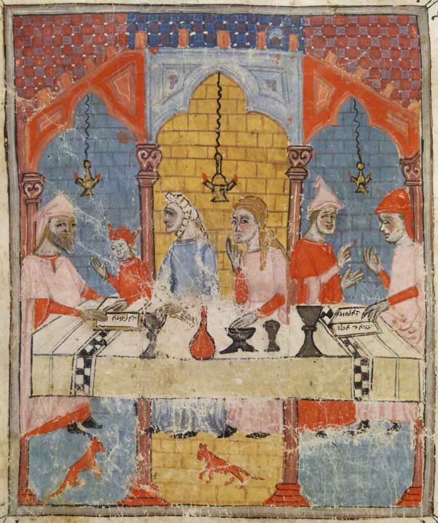 Hagadá Hermana (Barcelona, c. 1350). Cena de Séder de Pésaj con vino sobre la mesa